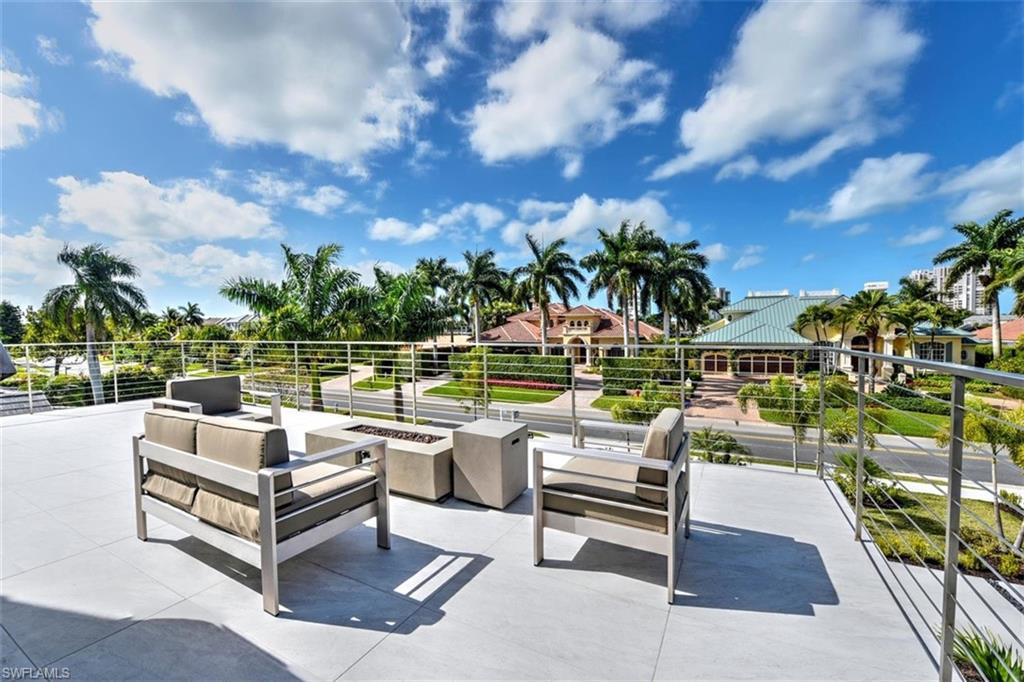 3860 Crayton Road Naples, FL 34103 - Photo 15 of 32 Balcony living