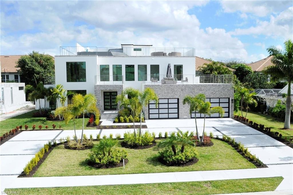 3860 Crayton Road Naples, FL 34103 - Photo 2 of 32 Front view of home with roof deck