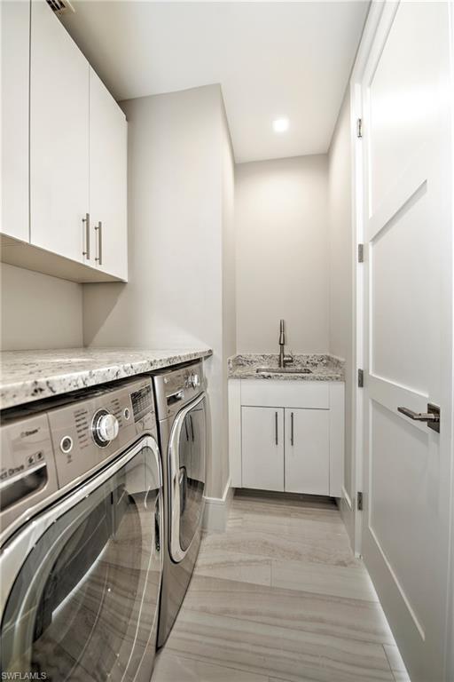 3860 Crayton Road Naples, FL 34103 - Photo 24 of 32 Laundry Room