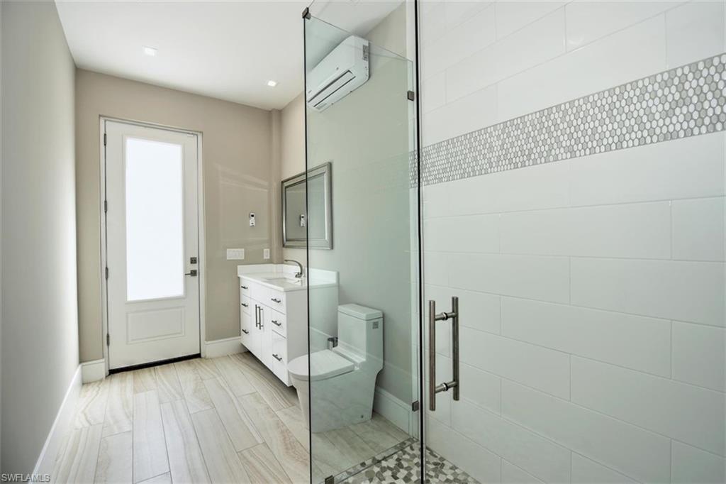 3860 Crayton Road Naples, FL 34103 - Photo 26 of 32 Pool Bathroom