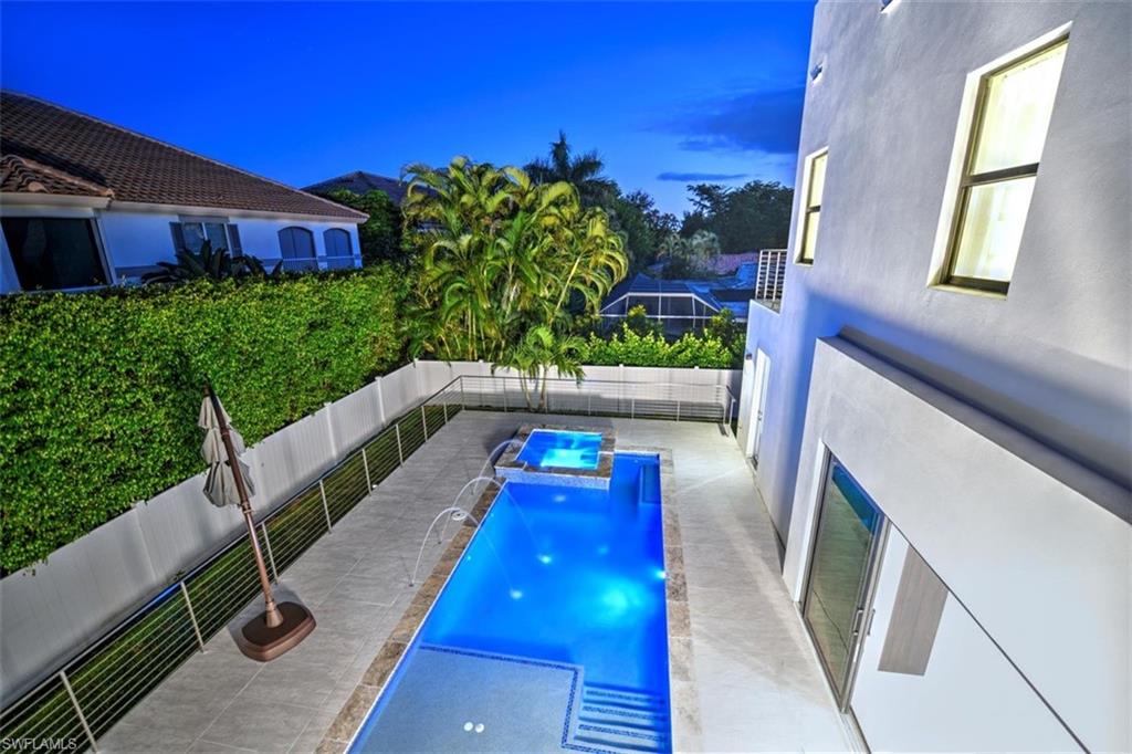 3860 Crayton Road Naples, FL 34103 - Photo 27 of 32 Balcony Pool View