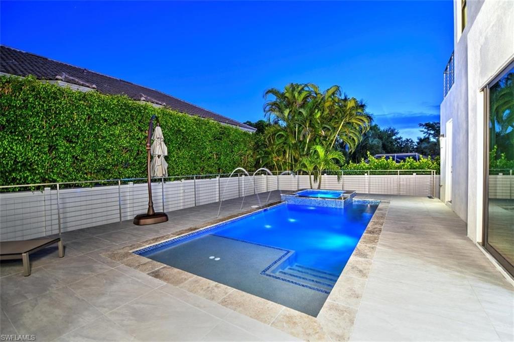 3860 Crayton Road Naples, FL 34103 - Photo 29 of 32 Pool at sunset