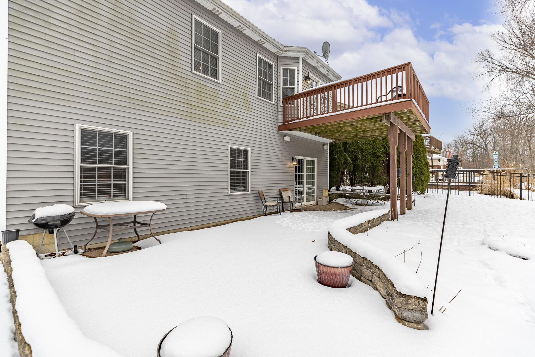 17 Browning Lane Valparaiso, IN 46383 - Photo 30 of 32 a view of a patio with table and chairs and potted plants