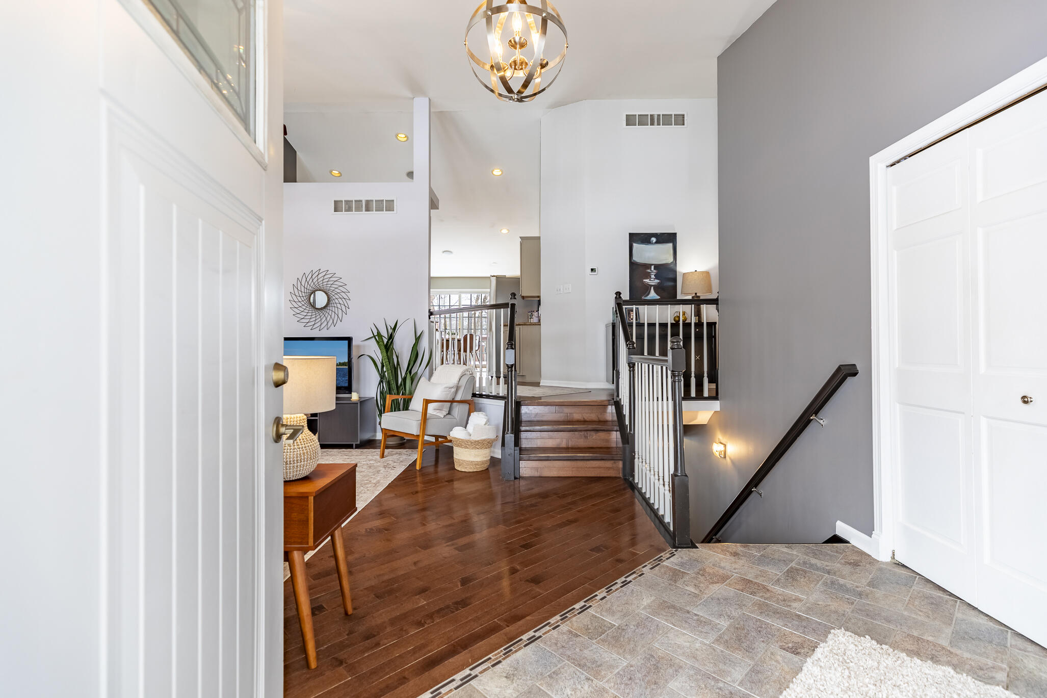 17 Browning Lane Valparaiso, IN 46383 - Photo 6 of 32 a living room with furniture and a chandelier