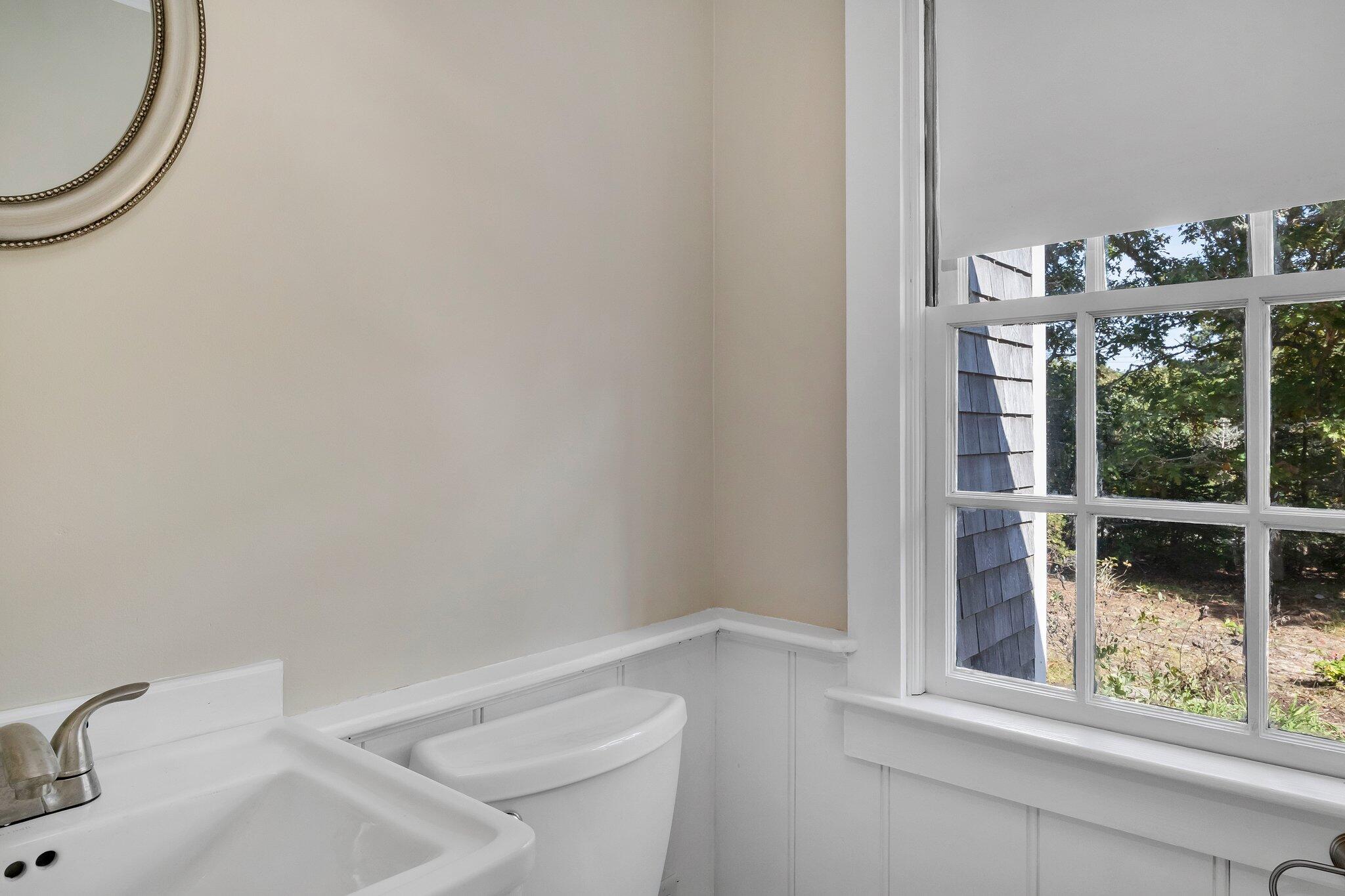 107 Chatham Road Harwich, MA 02645 - Photo 7 of 29 a bathroom with a toilet and a sink
