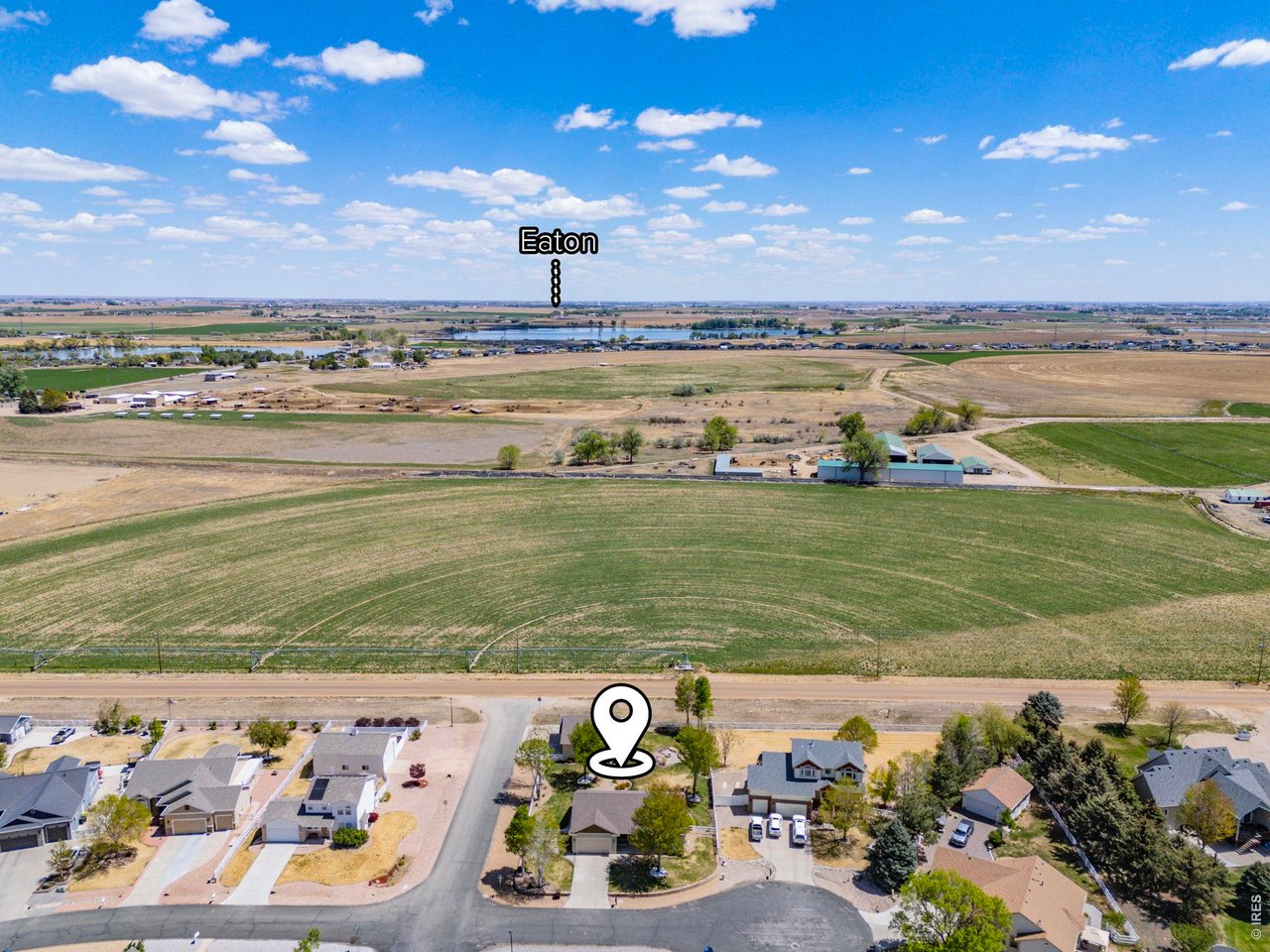 2002 Trail Ridge Drive Severance, CO 80615 - Photo 14 of 49 Situated on a private corner lot in a quiet cul-de-sac, this property backs to farm ground offering a peaceful, tucked-away feeling while still being conveniently close to town and ample amenities.