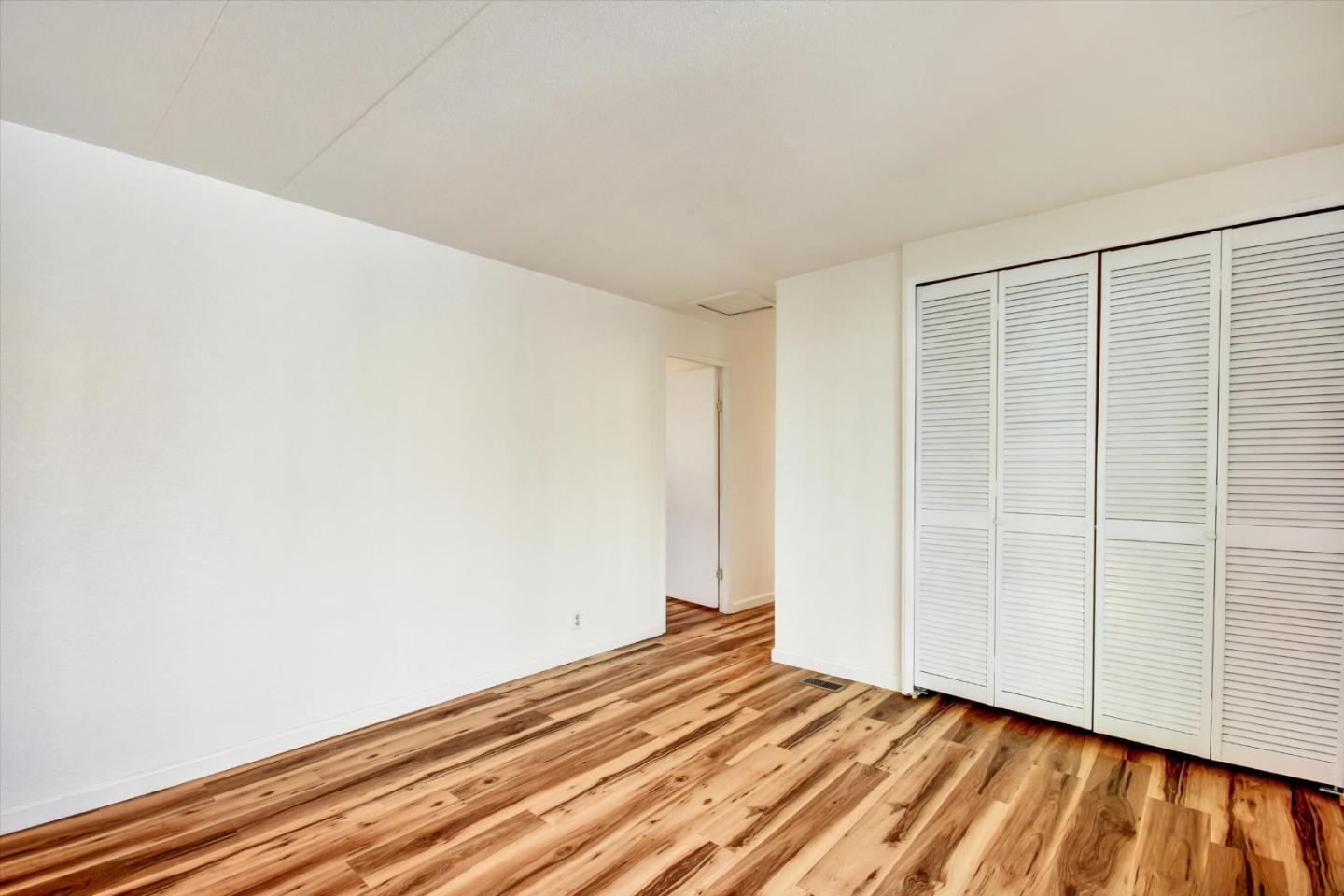 17 Pepperwood Way, Unit 17 Soquel, CA 95073 - Photo 19 of 56 a view of room with wooden floor