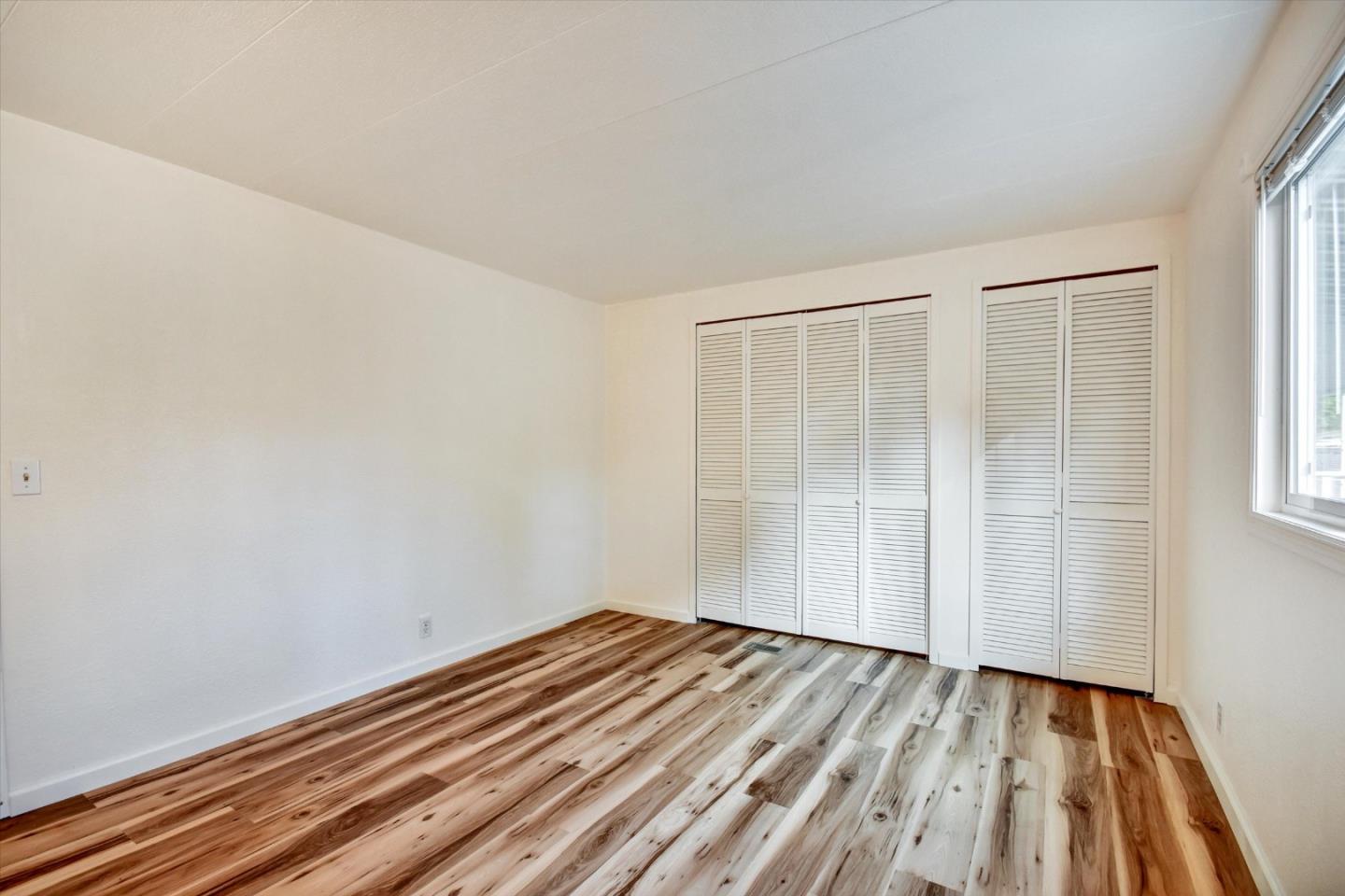 17 Pepperwood Way, Unit 17 Soquel, CA 95073 - Photo 22 of 56 wooden floor in an empty room
