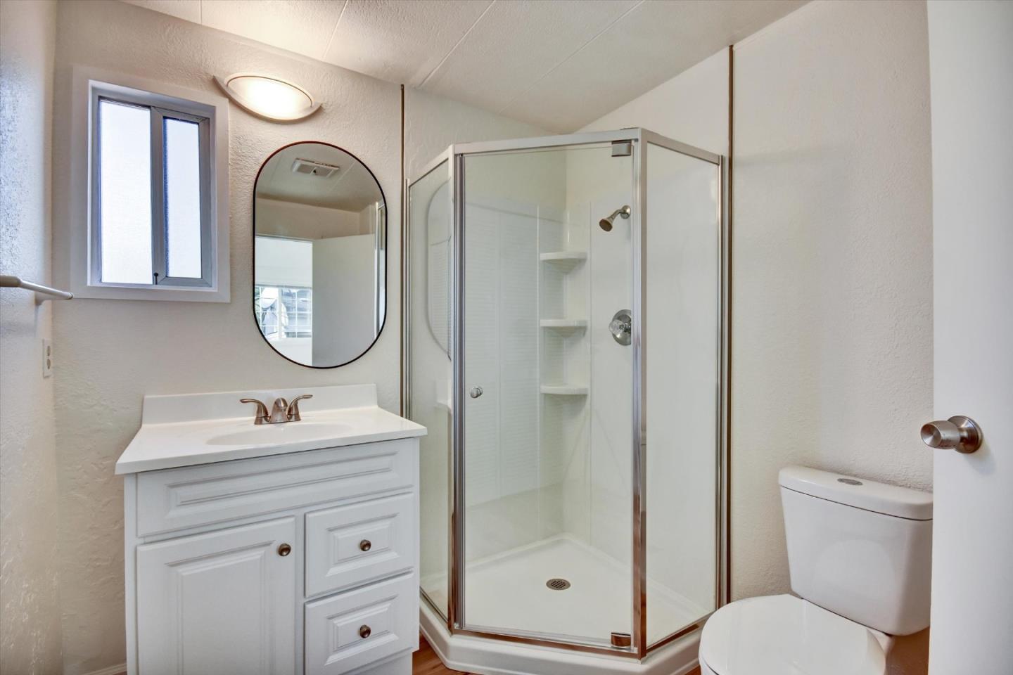 17 Pepperwood Way, Unit 17 Soquel, CA 95073 - Photo 35 of 56 a bathroom with a sink toilet and shower