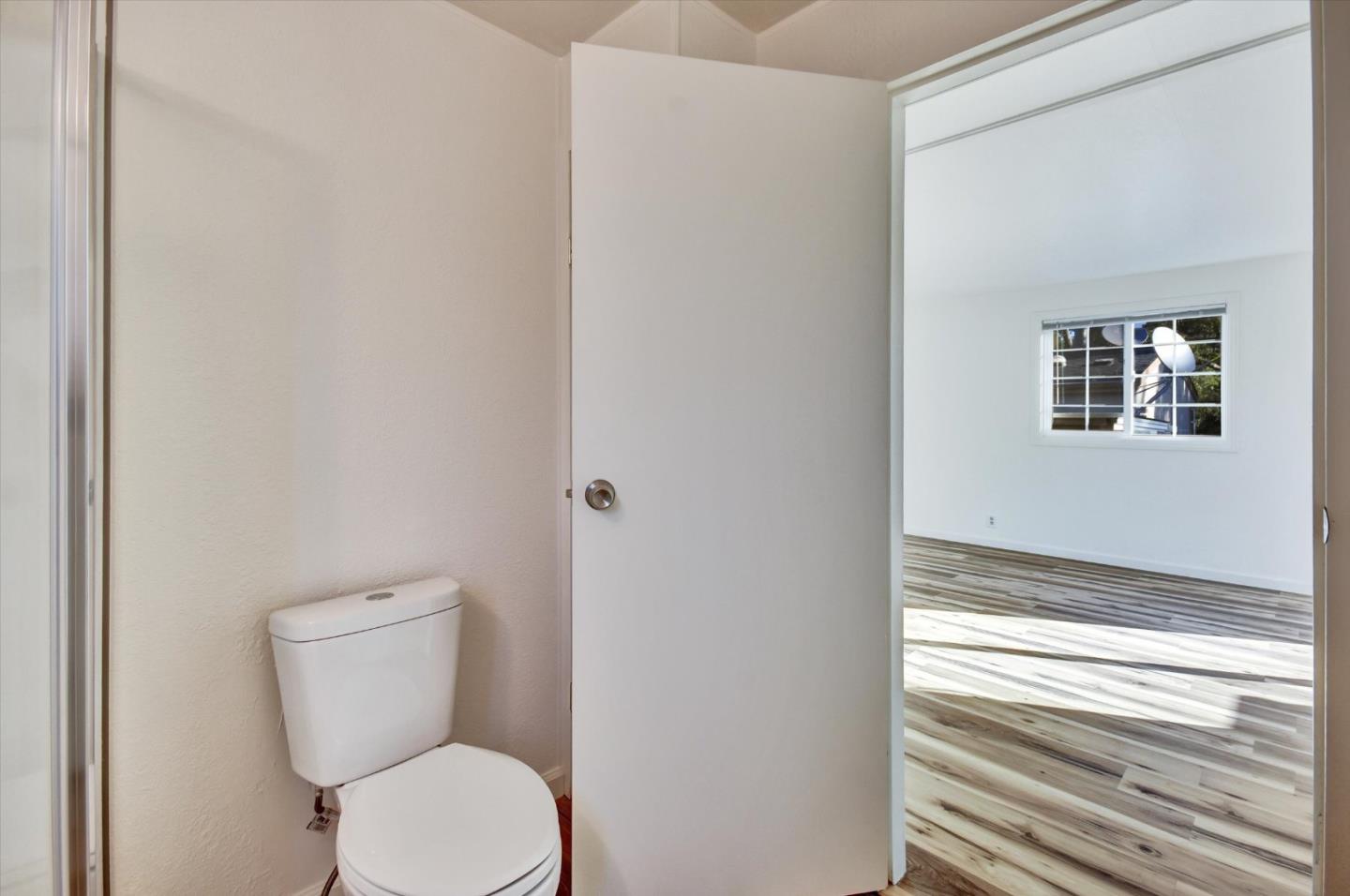 17 Pepperwood Way, Unit 17 Soquel, CA 95073 - Photo 37 of 56 a bathroom with a toilet