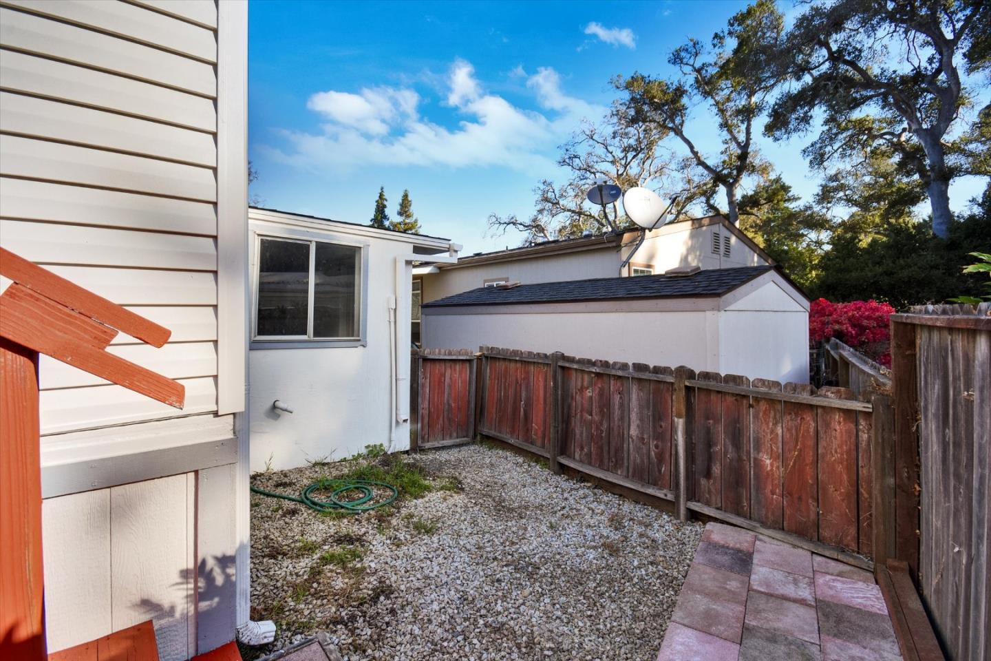 17 Pepperwood Way, Unit 17 Soquel, CA 95073 - Photo 41 of 56 a view of a house with a large tree and wooden fence