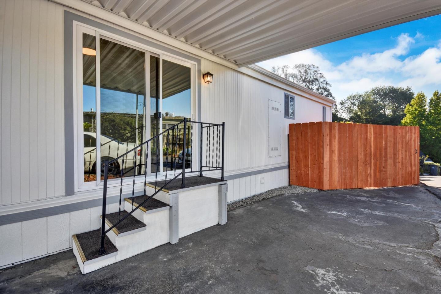 17 Pepperwood Way, Unit 17 Soquel, CA 95073 - Photo 48 of 56 a view of a porch with wooden floor and iron stairs