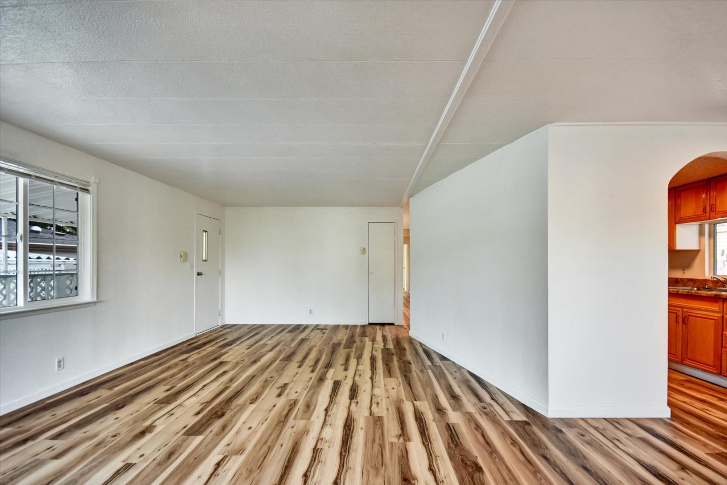 17 Pepperwood Way, Unit 17 Soquel, CA 95073 - Photo 5 of 56 a view of a room with wooden floor and staircase