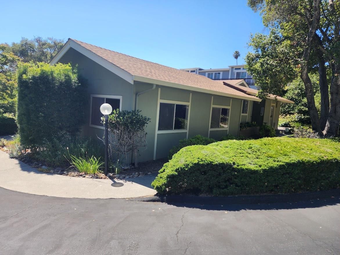 17 Pepperwood Way, Unit 17 Soquel, CA 95073 - Photo 52 of 56 a front view of a house with garden