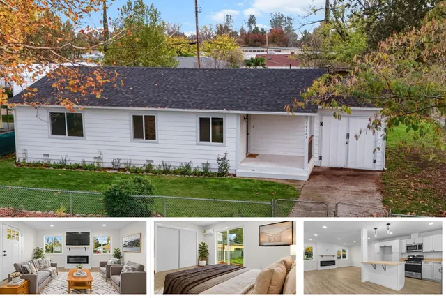 a aerial view of a house with a yard