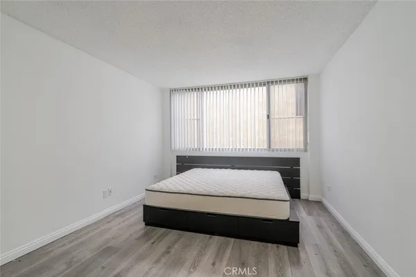 a big room with closet and mirror