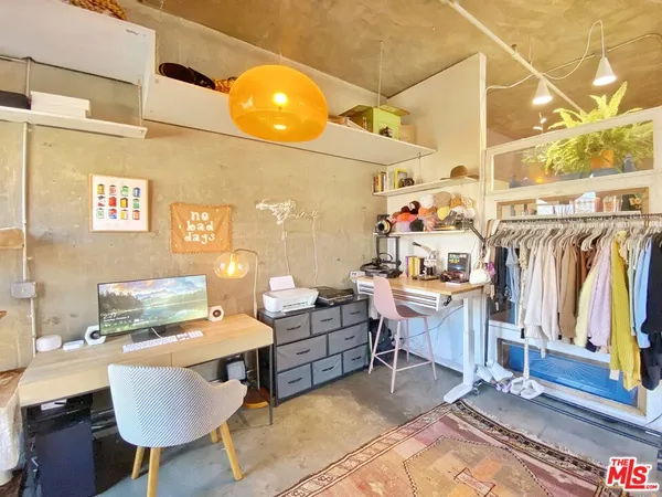 a view of living room kitchen and dining room