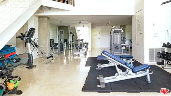 a bathroom with a tub and a shower