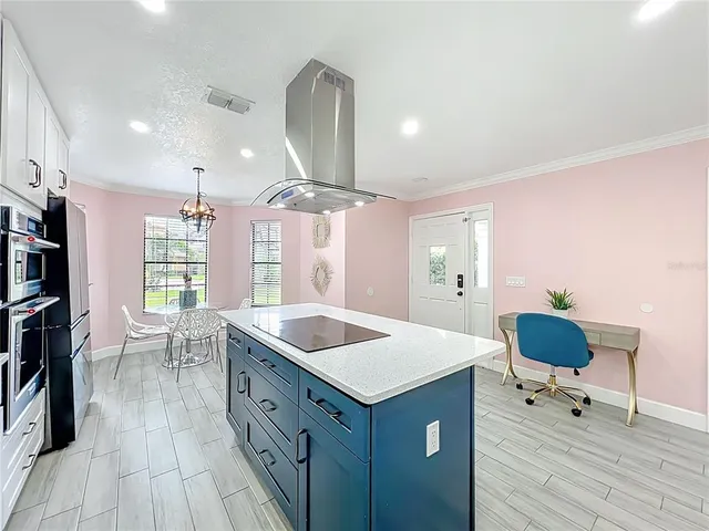 a view of a living room that has a fireplace