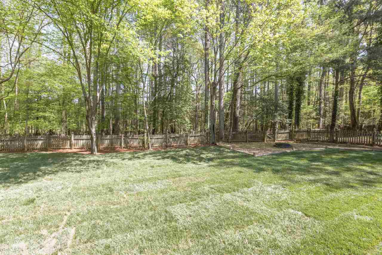 4608 Salem Ridge Road Holly Springs, NC 27540 - Photo 27 of 30 Private Back Yard backs to a wildlife/water easement – no development! Rear Yard