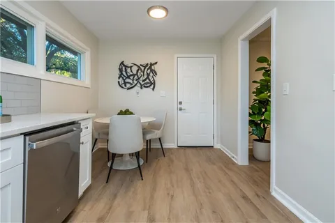 a workspace with furniture and wooden floor
