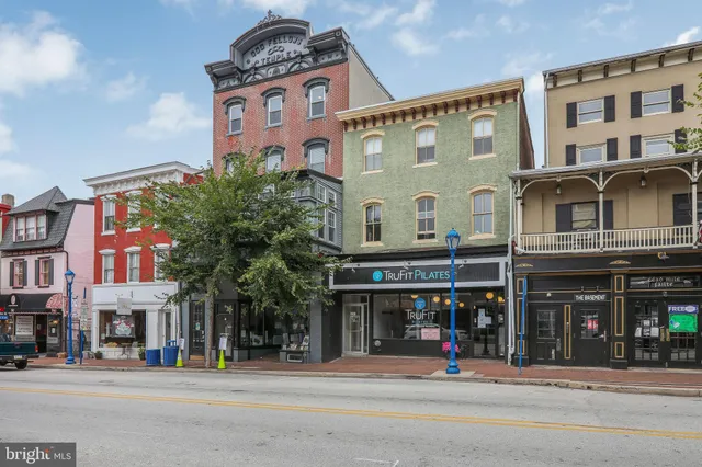a front view of a building with street