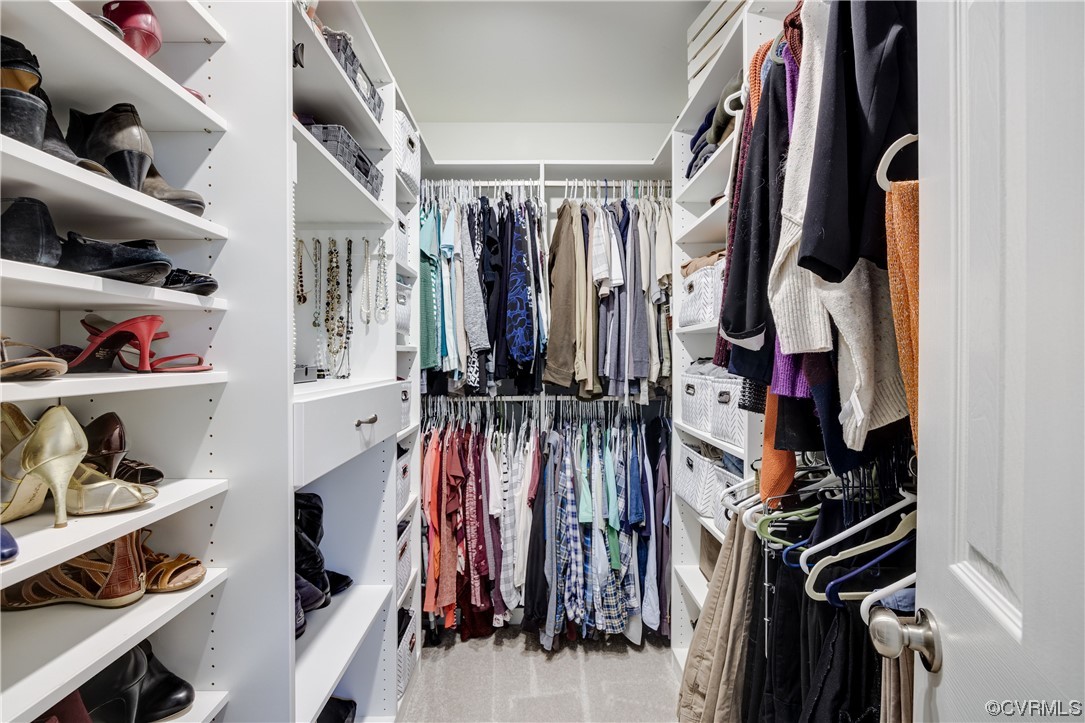 15201 Windy Ridge Road Midlothian, VA 23112 - Photo 18 of 30 a view of walk in closet with clothes and shoes