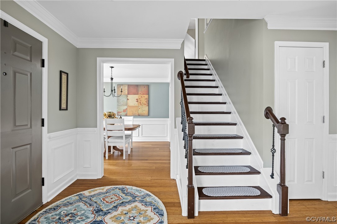 15201 Windy Ridge Road Midlothian, VA 23112 - Photo 4 of 30 a view of entryway and hall with wooden floor