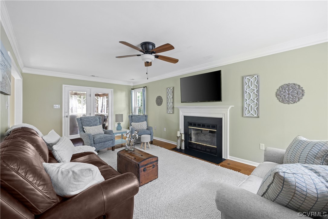 15201 Windy Ridge Road Midlothian, VA 23112 - Photo 5 of 30 a living room with furniture a fireplace