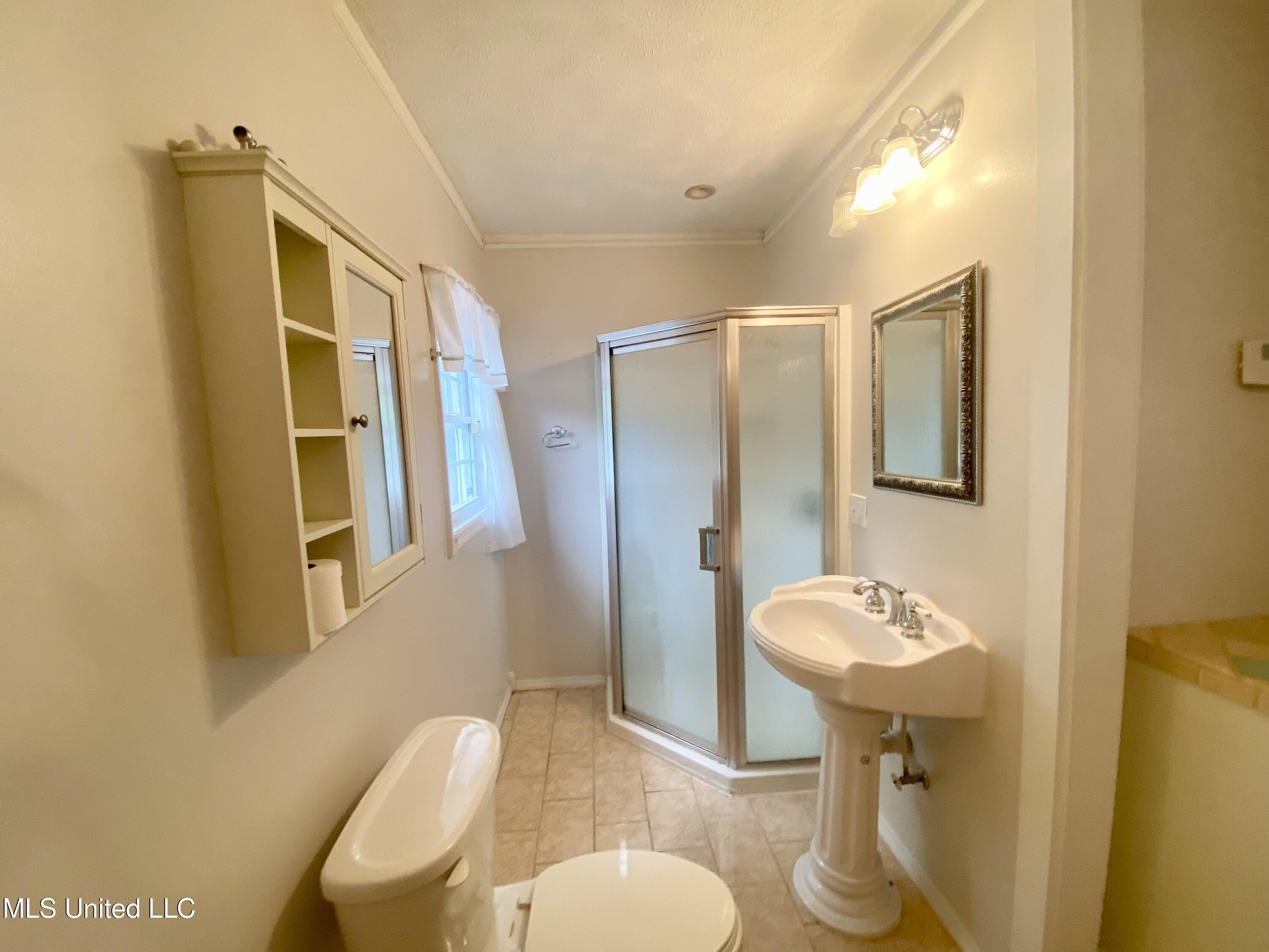119 Dampeer Street Crystal Springs, MS 39059 - Photo 21 of 23 119 Dampeer Street Upstairs Bath Area 2