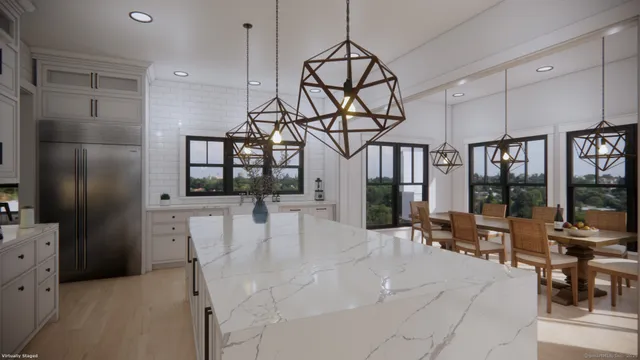 a view of a living room and chandelier fan