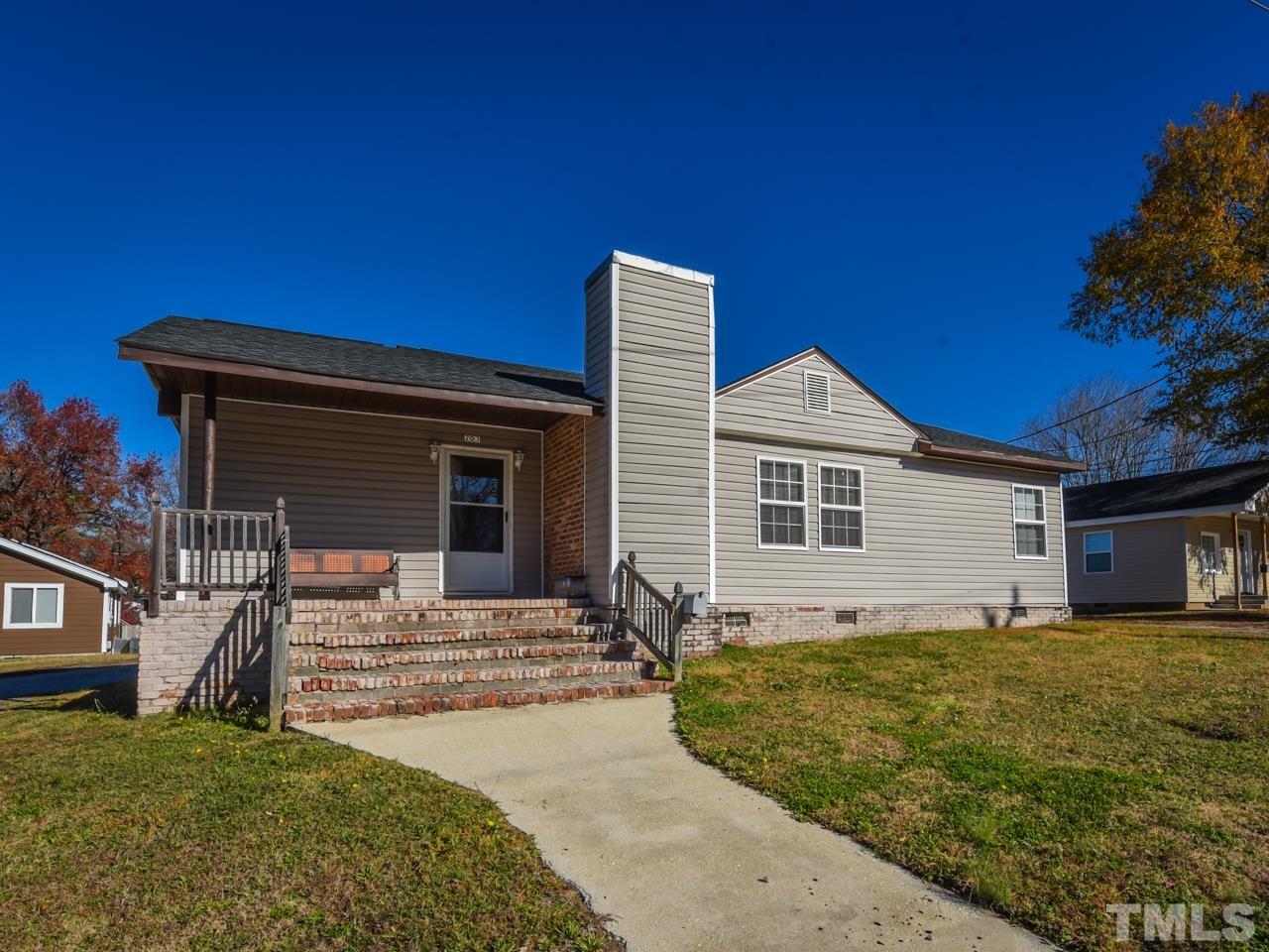 a house view with a outdoor space