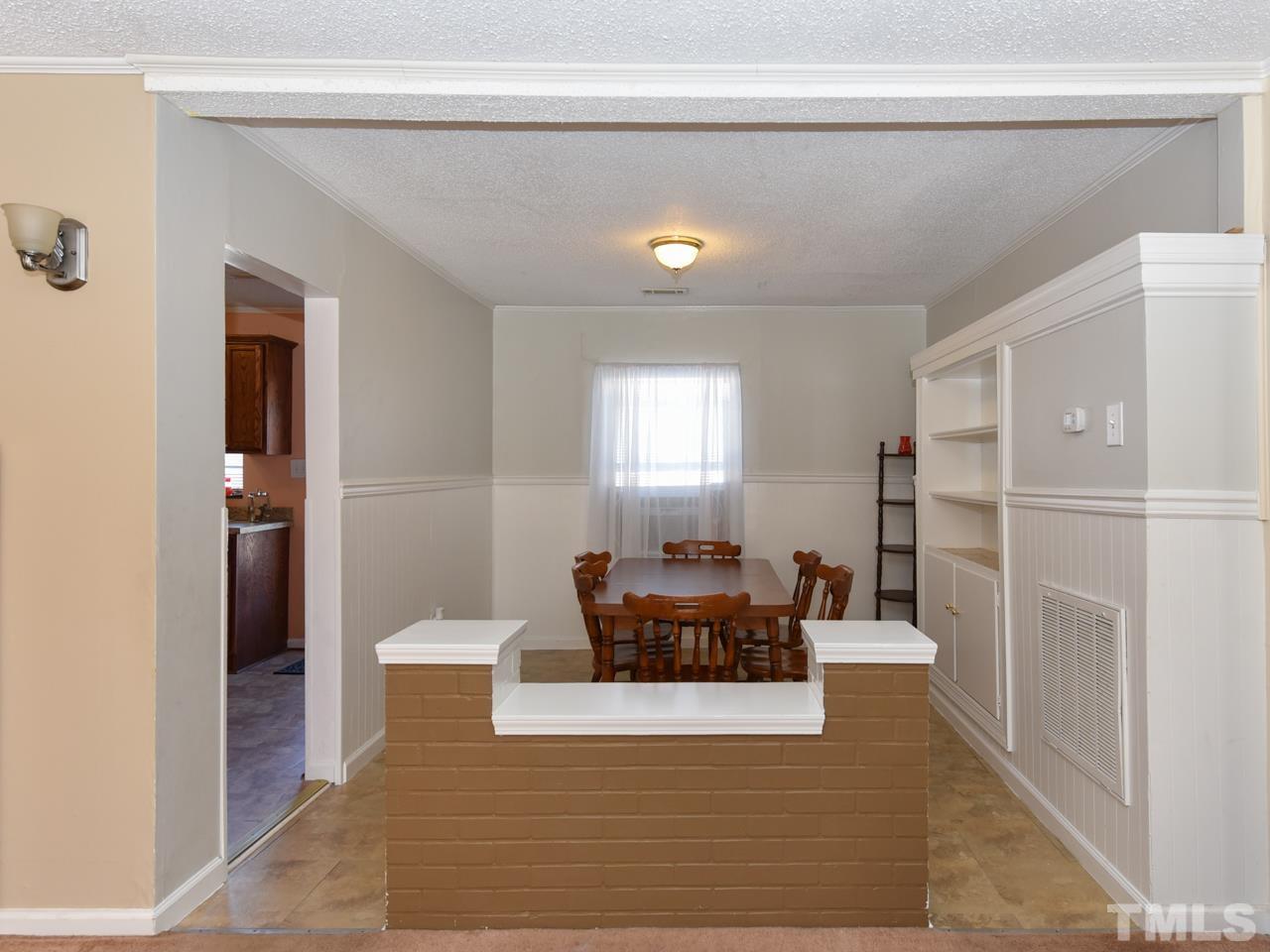 203 Smith Drive Garner, NC 27529 - Photo 9 of 13 a living room with furniture and a window