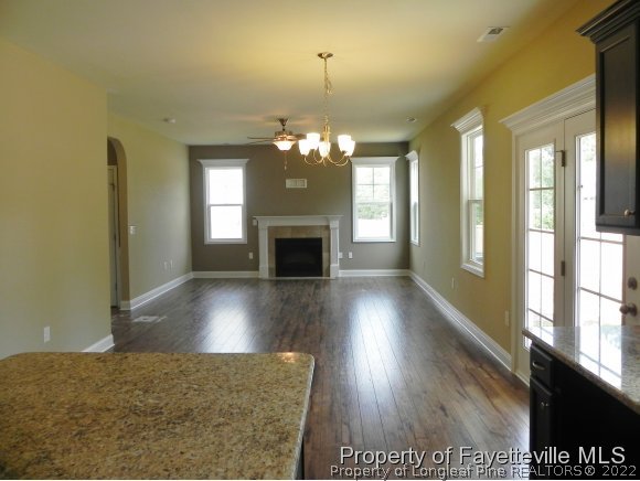 145 Shellbark Drive Spring Lake, NC 28390 - Photo 5 of 22 a view of a livingroom with a fireplace and window