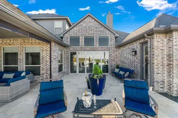 a front view of a house with patio