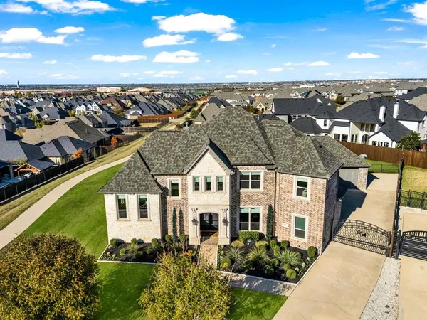an aerial view of a house with a garden