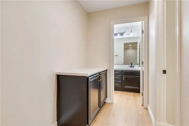 an aerial view of residential houses with outdoor space and swimming pool