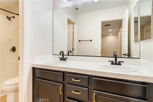 a view of a swimming pool with a table and chairs