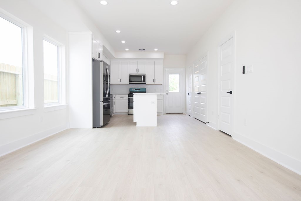 4137 Mallow Street, Unit A Houston, TX 77051 - Photo 13 of 16 a view of a kitchen with refrigerator and window