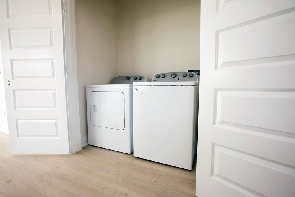 4137 Mallow Street, Unit A Houston, TX 77051 - Photo 16 of 16 a utility room with dryer and washer