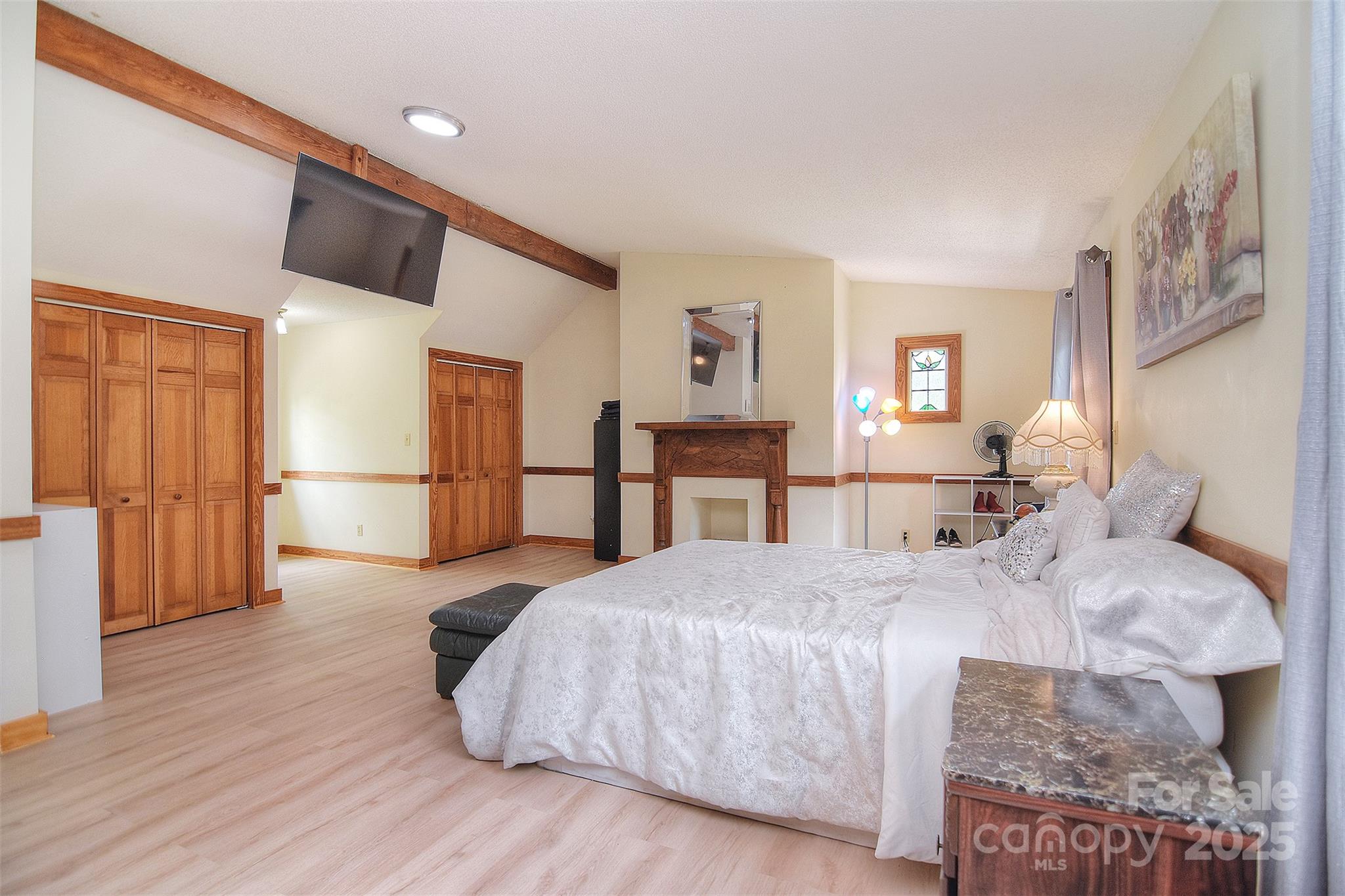 109 Larch Road Salisbury, NC 28147 - Photo 26 of 43 a bed room with a bed and a view of kitchen