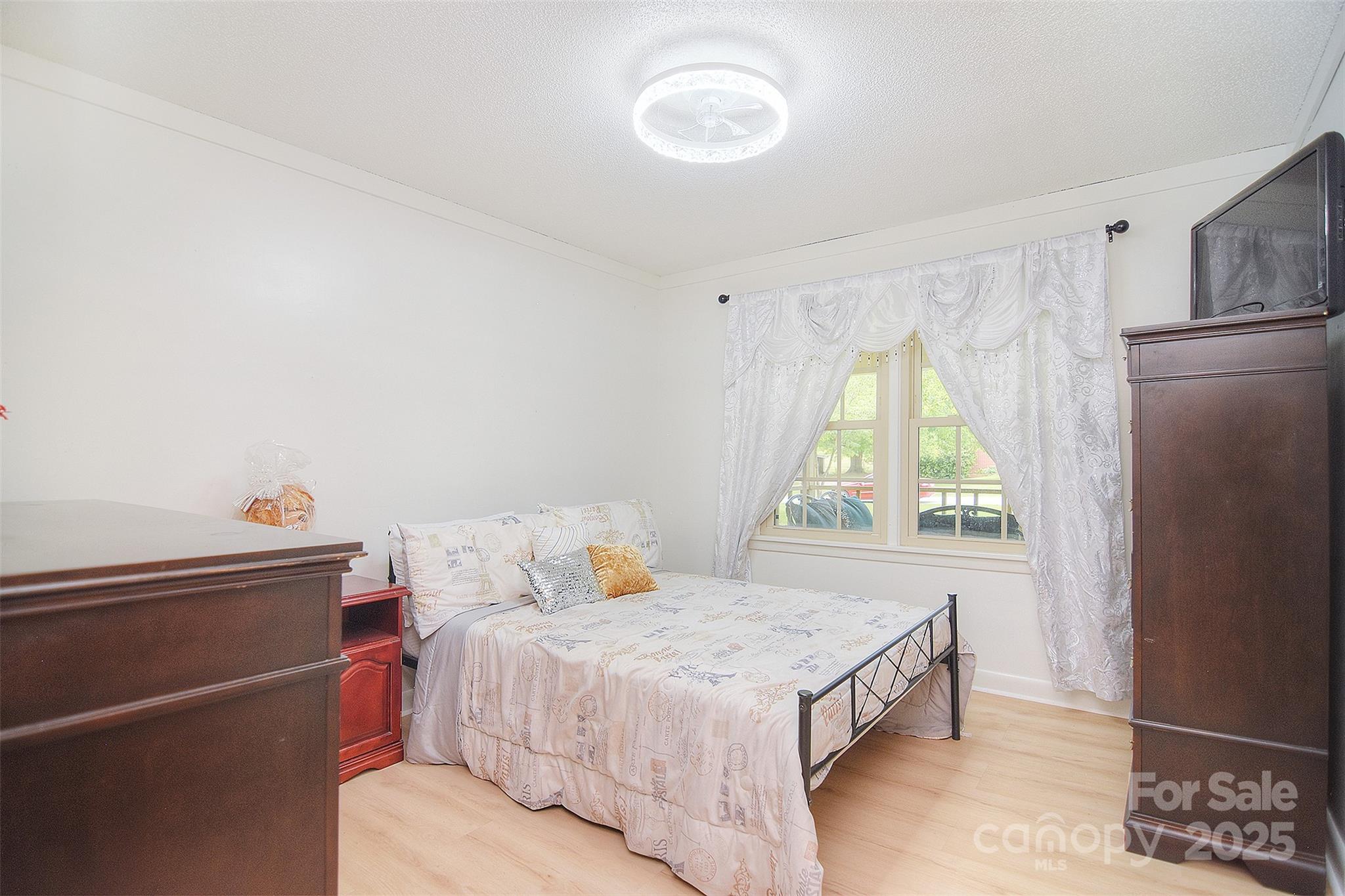 109 Larch Road Salisbury, NC 28147 - Photo 34 of 43 a bedroom with a bed and a window