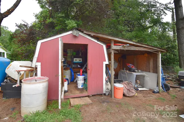 a view of a room with storage and utility room