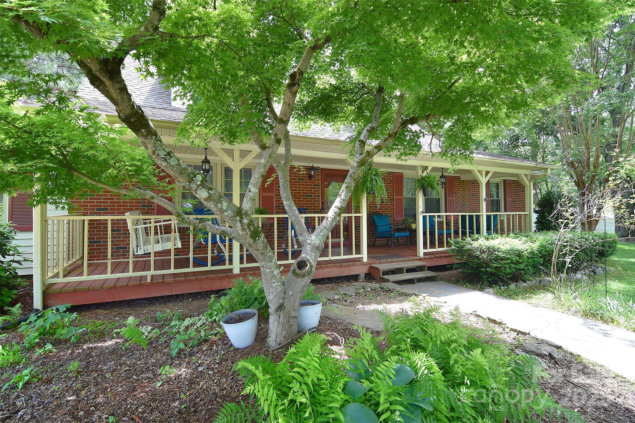109 Larch Road Salisbury, NC 28147 - Photo 8 of 43 a view of a house with backyard and porch