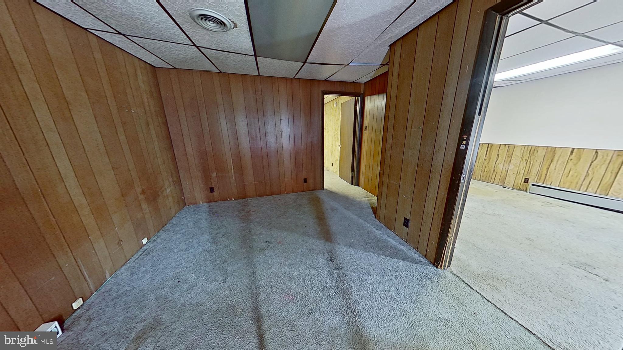 17 East Main Street, Unit 2 Dallastown, PA 17313 - Photo 5 of 8 a view of a room with a wooden door