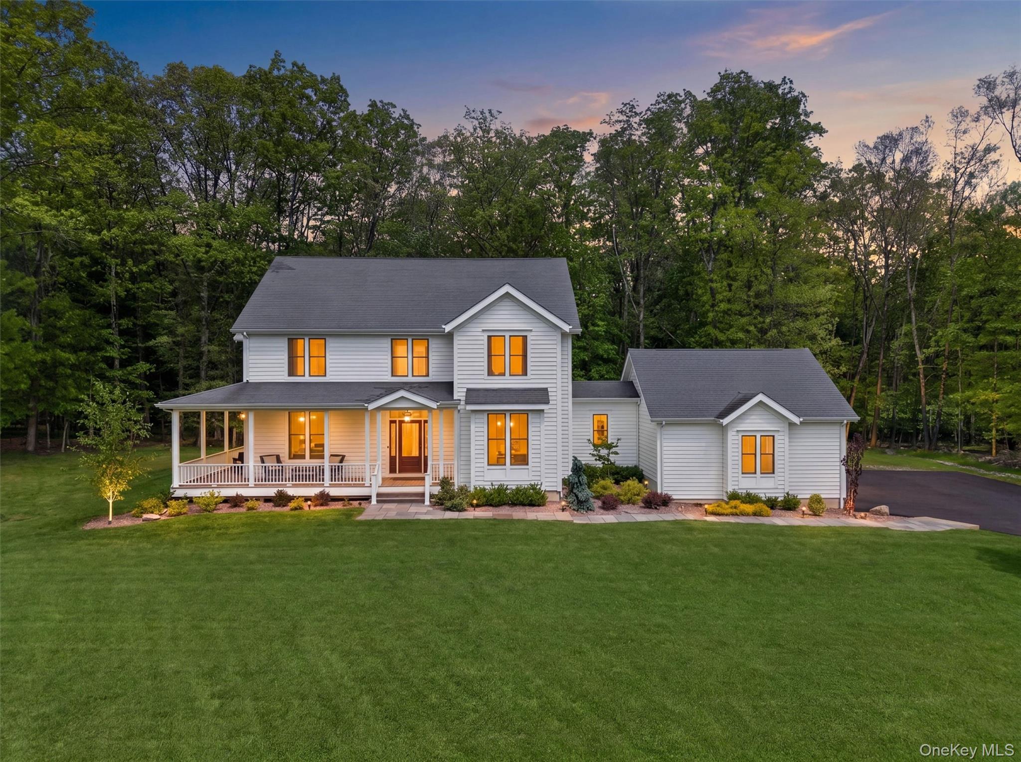 28 Bethlehem Road New Windsor, NY 12553 - Photo 1 of 50 a aerial view of a house with a yard table and chairs