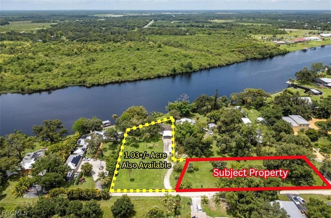 2014 Fort Denaud Road LaBelle, FL 33935 - Photo 10 of 11 an aerial view of lake and residential houses with outdoor space