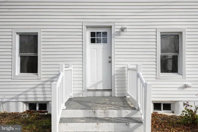a view of a house with white door