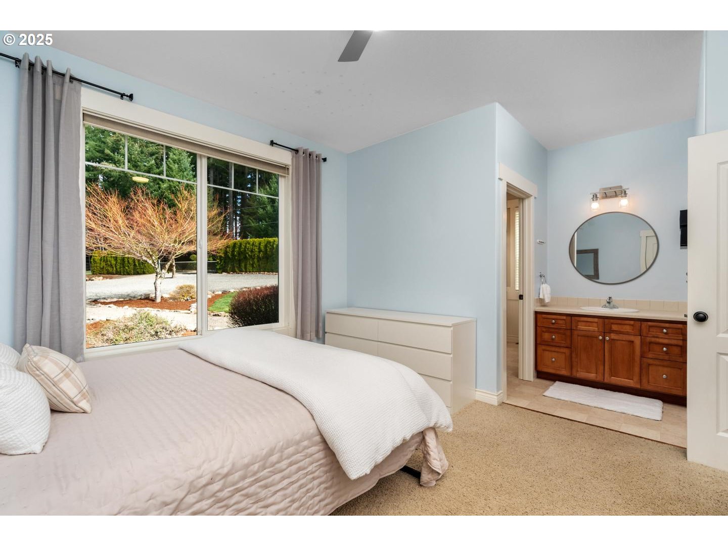 21481 South Ridge Road Oregon City, OR 97045 - Photo 22 of 48 a bedroom with a double bed and a dresser