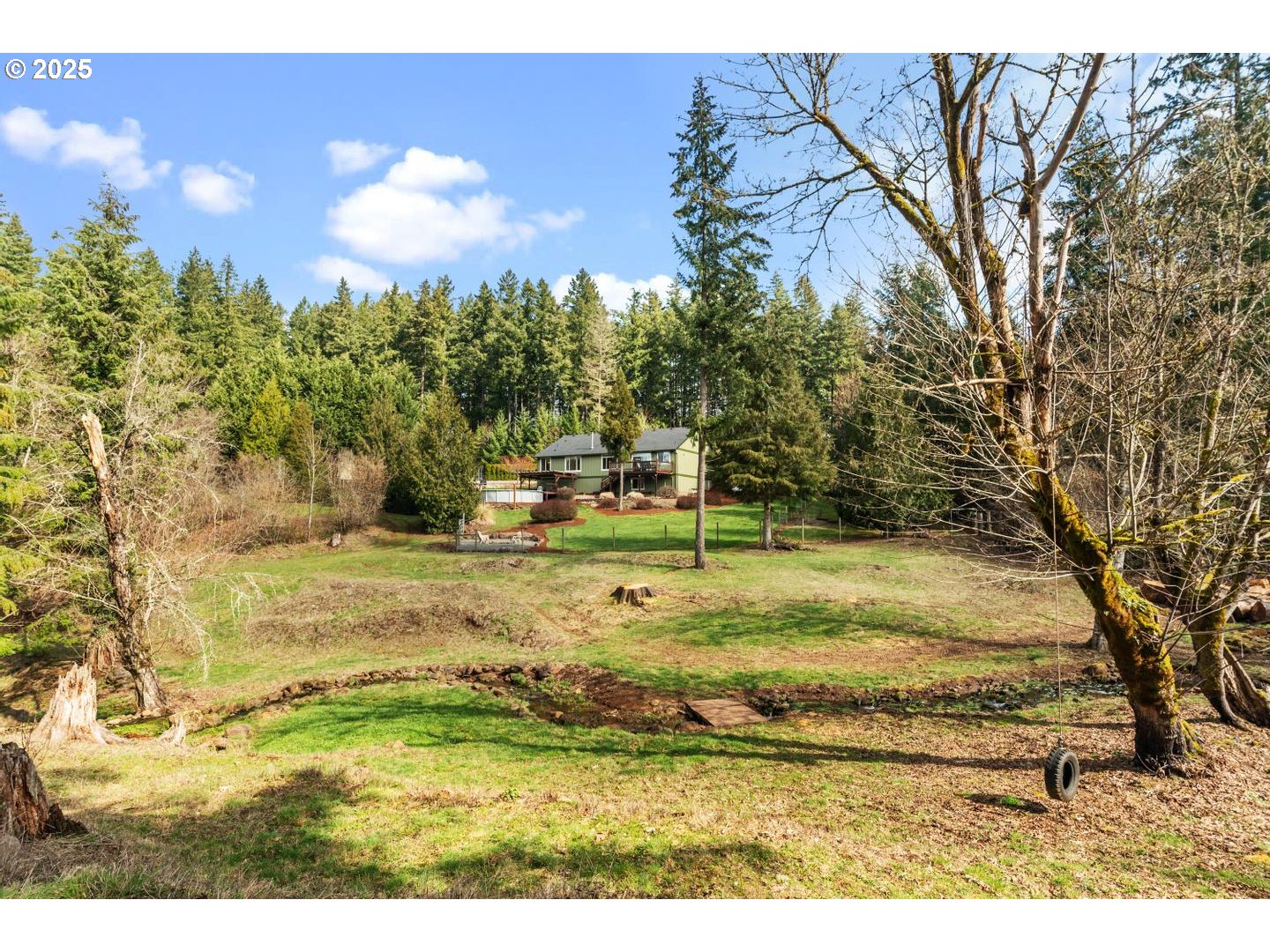 21481 South Ridge Road Oregon City, OR 97045 - Photo 38 of 48 a view of a yard with an trees
